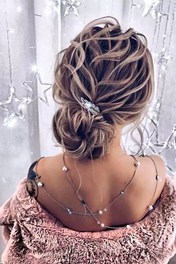 Messy Low Bun with Volume graduation hairstyles