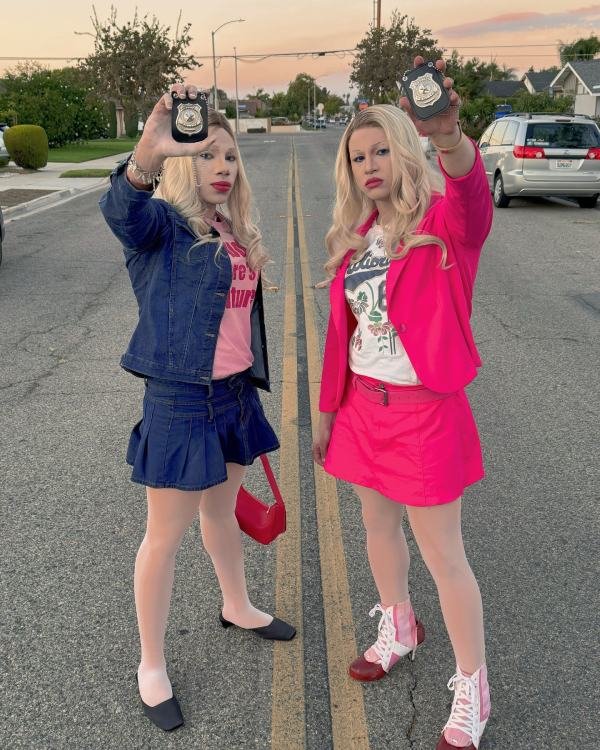 Funny halloween costume of people wearing white chick inspired movie costume
