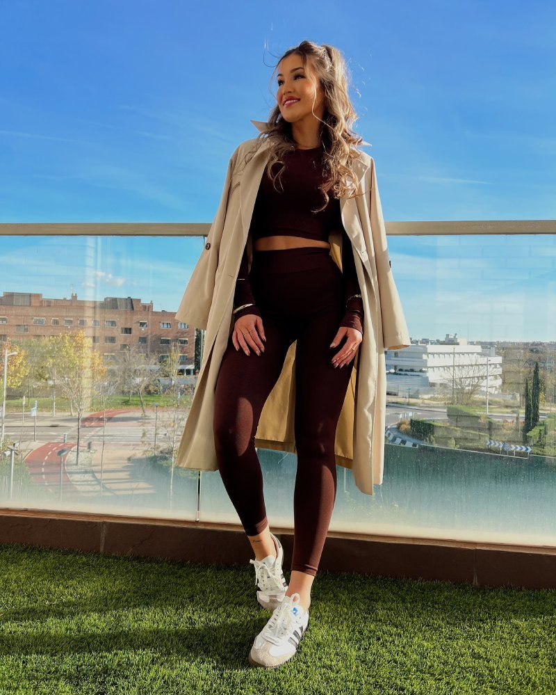 Woman wearing Brown Leggings With a Trench Coat