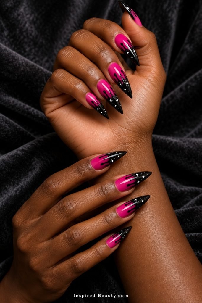Hot pink halloween nails with black drip with stars
